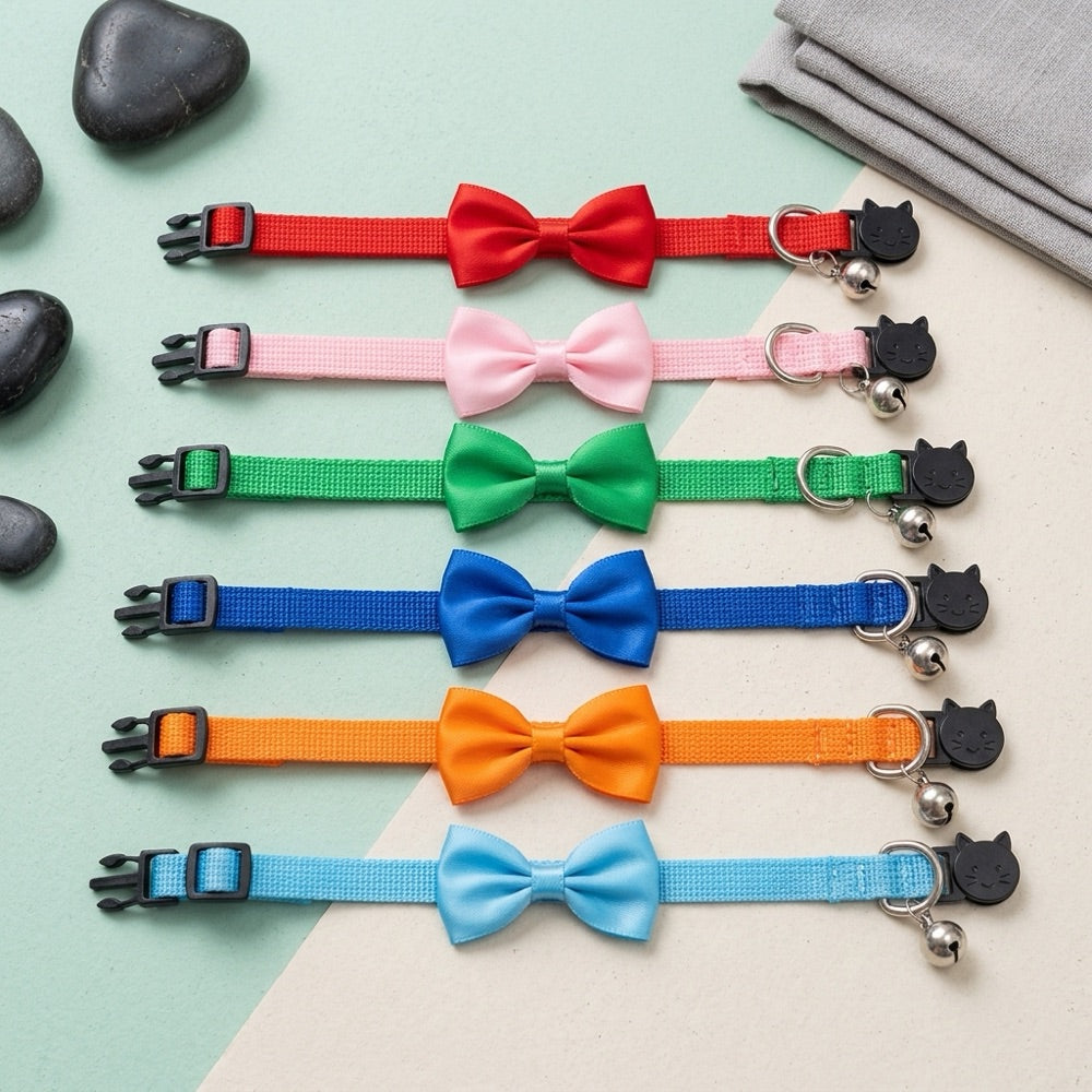 PawNoodle bow and bell cat collar shown in multiple colors