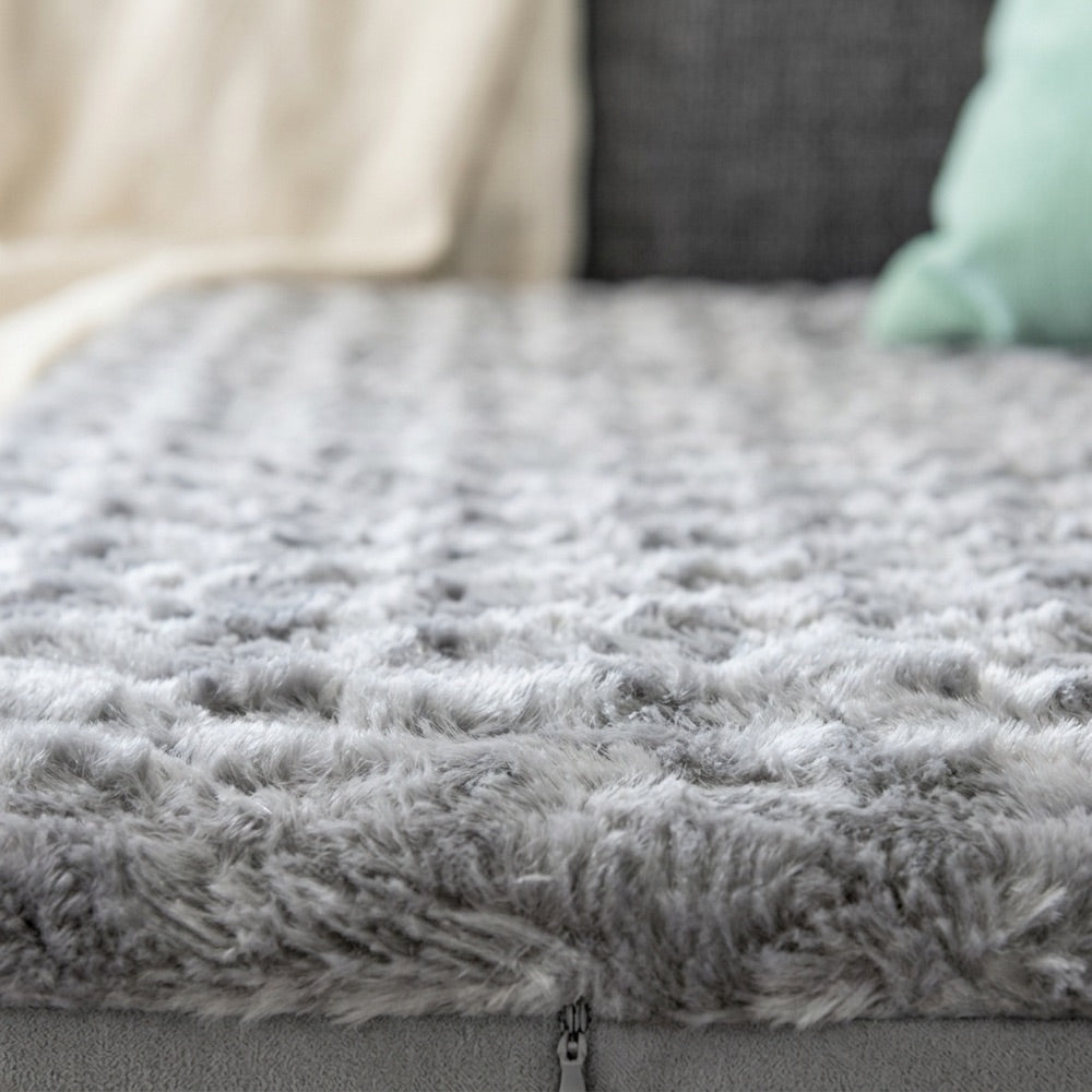 Close-up of the cooling-gel plush top of the pet mattress